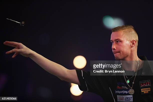 Wesley Harms of The Netherlands in action during his first round match on day four of the BDO Lakeside World Professional Darts Championships on...