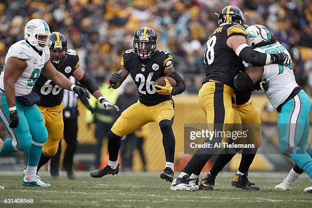 Playoffs: Pittsburgh Steelers Le'Veon Bell in action, rushing vs Miami Dolphins at Heinz Field. Pittsburgh, PA 1/8/2017 CREDIT: Al Tielemans