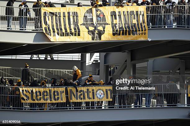 Playoffs: View of Pittsburgh Steelers fans with banners that read STILLER GANG and STEELER NATION during game vs Miami Dolphins at Heinz Field....