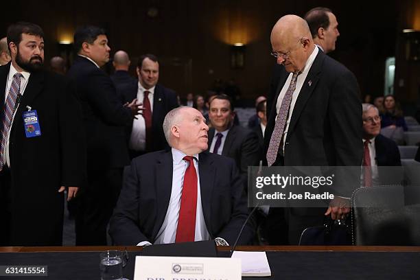 Central Intelligence Agency Director John Brennan and Director of National Intelligence James Clapper arrive to testify before the Senate...