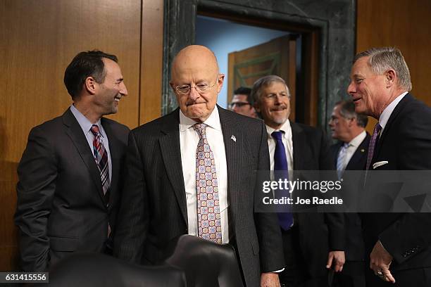 Director of National Intelligence James Clapper arrives to testify before the Senate Intelligence Committee in the Dirksen Senate Office Building on...