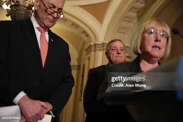 Sen. Patty Murray speaks as Senate Minority Leader Sen. Charles Schumer and Senate Minority Whip Sen. Richard Durbin listen during a news briefing...