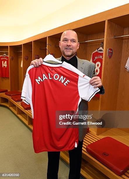 Denver Nuggets Head Coach Michael Malone poses for a photo in the locker of Arsenal Football Club as part of 2017 NBA London Global Games at Emirates...