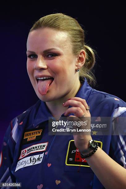 Anastasia Dobromyslova of Russia celebrates during her first round match against on day four of the BDO Lakeside World Professional Darts...