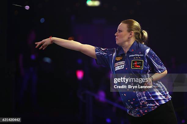 Anastasia Dobromyslova of Russia in action during her first round match against on day four of the BDO Lakeside World Professional Darts...