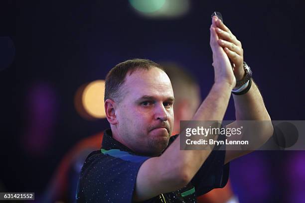 Dennis Labanauskas of Lithuania celebrates winning his first round match on day four of the BDO Lakeside World Professional Darts Championships on...