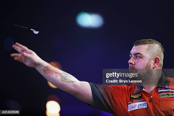 Conan Whitehead of Great Britain in action in his first round match on day four of the BDO Lakeside World Professional Darts Championships on January...