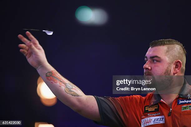 Conan Whitehead of Great Britain in action in his first round match on day four of the BDO Lakeside World Professional Darts Championships on January...