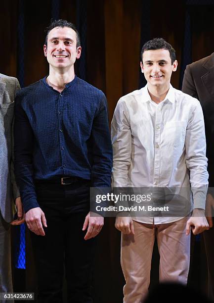 Cast members Ben Turner and Andrei Costin bow at the curtain call during the press night performance of "The Kite Runner" at Wyndhams Theatre on...