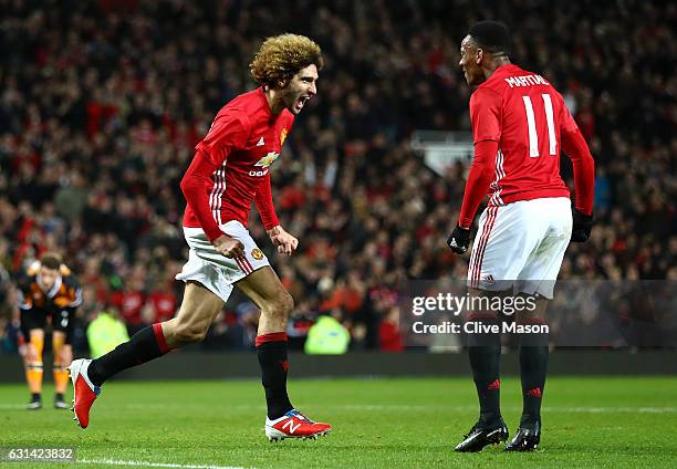Marouane Fellaini of Manchester United celebrates after scoring his sides second goal his sides second goal during the EFL Cup Semi-Final First Leg...