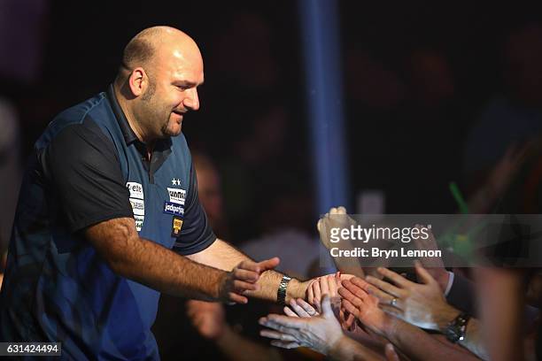 Scott Waites of Great Britain walks on for his first round match on day four of the BDO Lakeside World Professional Darts Championships on January...