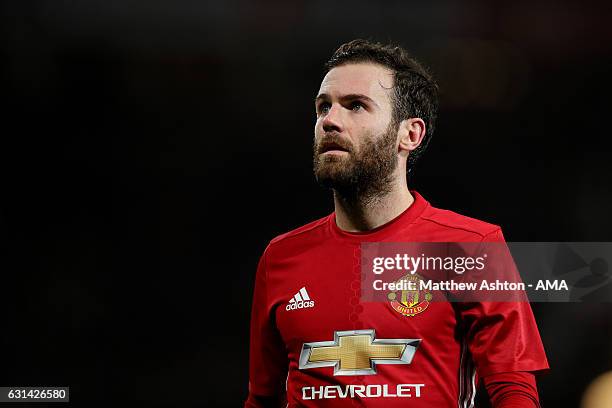 Juan Mata of Manchester United looks on during the EFL Cup Semi-Final first leg match between Manchester United and Hull City at Old Trafford on...