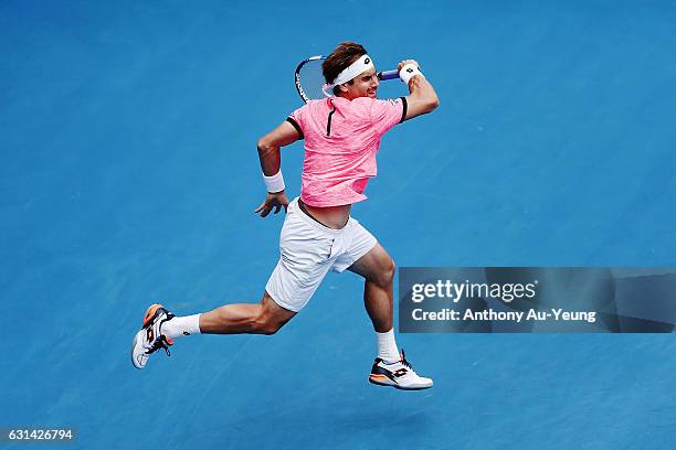 David Ferrer of Spain plays a forehand in his match against Robin Haase of Netherlands on day ten of the ASB Classic on January 11, 2017 in Auckland,...
