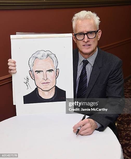 John Slattery poses with his caricature at the Sardi's Caricatures Unveiling at Sardi's on January 10, 2017 in New York City.