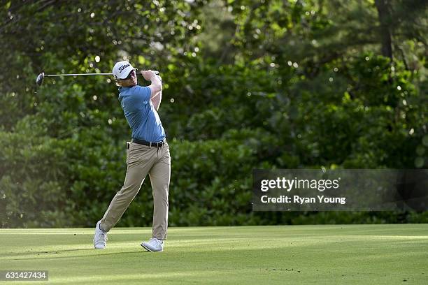 Anders Albertson hits an approach shot on the ninth hole during the third round of The Bahamas Great Exuma Classic at Sandals - Emerald Bay Course on...