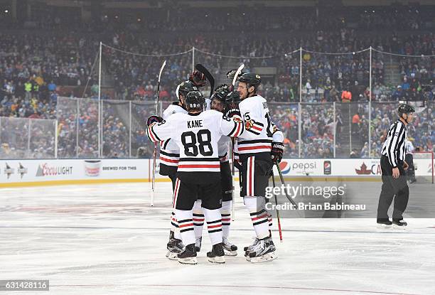 Patrick Kane, Trevor van Riemsdyk, Michal Kempny, Artemi Panarin and Artem Anisimov of the Chicago Blackhawks celebrate Kempny's first period goal...