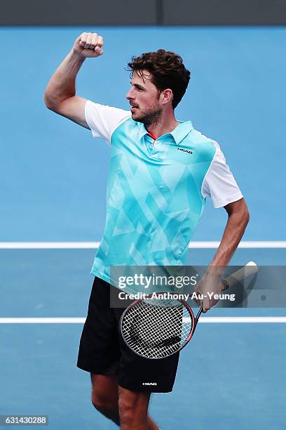 Robin Haase of Netherlands celebrates after winning his match against David Ferrer of Spain on day ten of the ASB Classic on January 11, 2017 in...