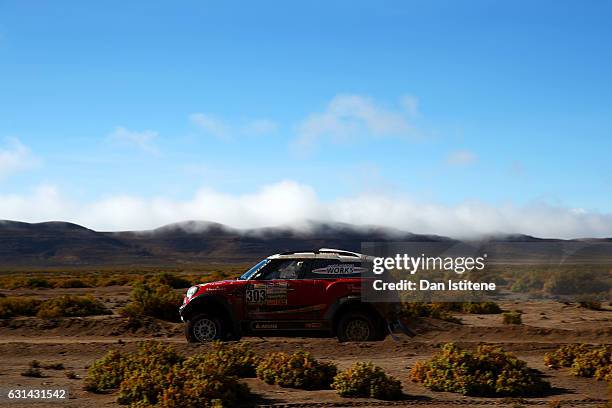 Mikko Hirvonen of Finland and Mini X-Raid drives with co-driver Michel Perin of France in the John Cooper Works Rally Mini car in the Classe : T1.2 :...