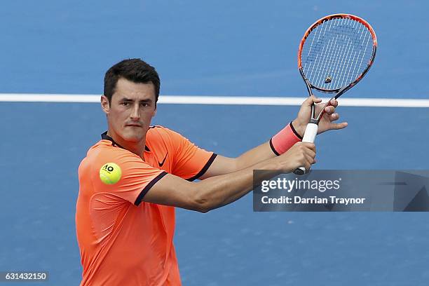 Bernard Tomic of Australia plays a backhand shot in his match against David Goffin of Belgium during day two of the 2017 Priceline Pharmacy Classic...