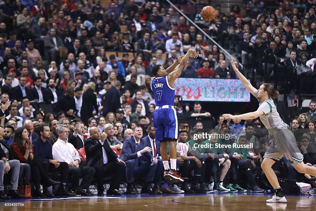 Toronto Raptors wearing their throw back Toronto Huskies uniforms play the Boston Celtics