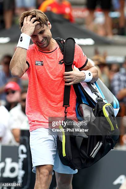 David Ferrer of Spain leaves the court following the mens singles match between Robin Haase of the Netherlands and David Ferrer of Spain on day 10 of...