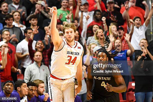 Matthew Temple of the Texas Tech Red Raiders reacts to making a three point basket during the first half of the game against the Kansas State...