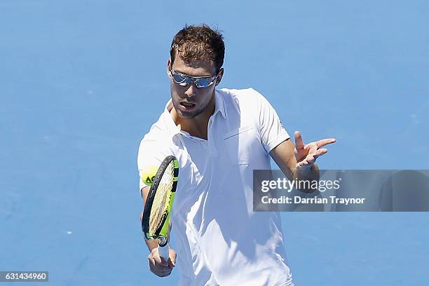 Jerzy Janowicz of Poland plays a backhand shot in his match against Yoshihito Nishioka of Japan during day two of the 2017 Priceline Pharmacy Classic...