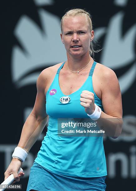 Kiki Bertens of the Netherlands celebrates winning match point in her second round match against Galina Voskoboeva of Kazakhstan during day two of...