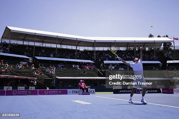 Jerzy Janowicz of Poland serves in his match against Yoshihito Nishioka of Japan during day two of the 2017 Priceline Pharmacy Classic at Kooyong...