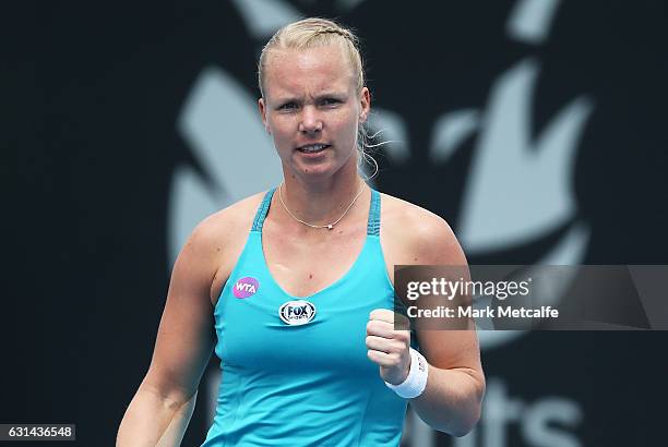 Kiki Bertens of the Netherlands celebrates winning match point in her second round match against Galina Voskoboeva of Kazakhstan during day two of...