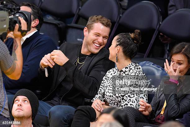 Colton Underwood and Aly Raisman attend a basketball game between the Portland Trail Blazers and the Los Angeles Lakers at Staples Center on January...