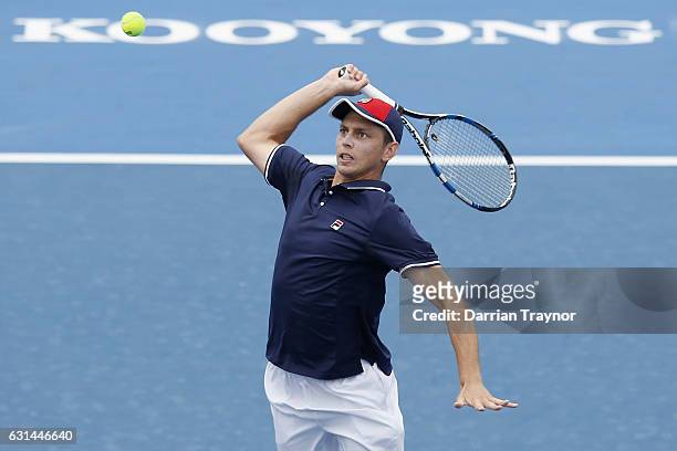 Andrew Whittington of Australia plays a forehand shot in his match against Mikhail Youzhny of Russia during day two of the 2017 Priceline Pharmacy...