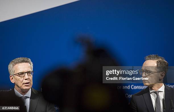 German Interior Minister Thomas de Maiziere and German Justice Minister Heiko Maas speak to the media about anti-terror measures after the terror...