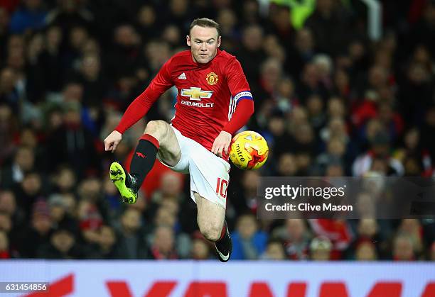 Yne Rooney of Manchester United controls the ball during the EFL Cup Semi-Final first leg match between Manchester United and Hull City at Old...