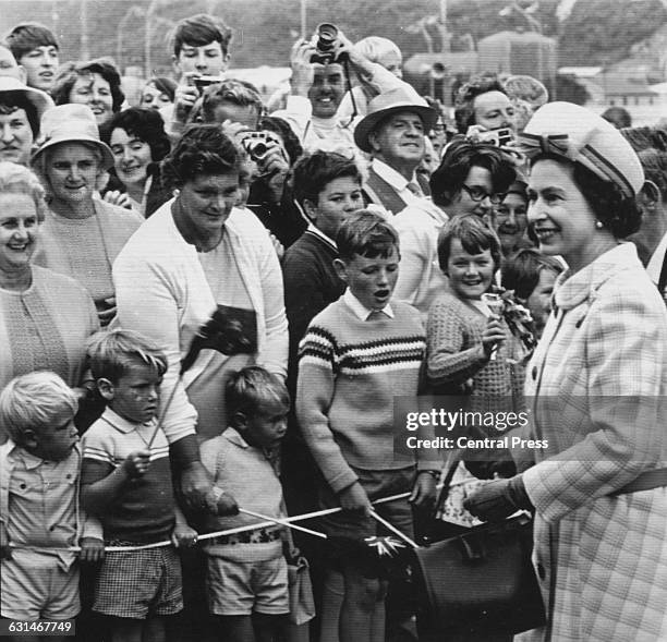 Queen Elizabeth II meets the crowds at the West Coast Industries Fair in Greymouth, during her visit to New Zealand, March 1970. She is there in...