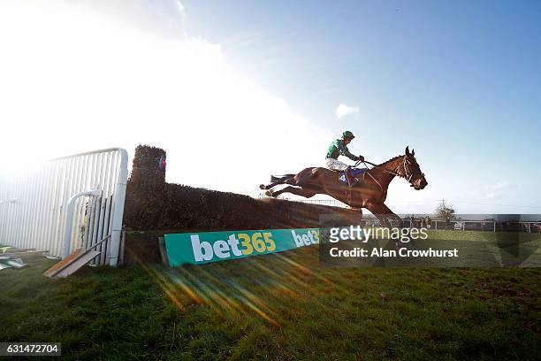 Daryl Jacob riding Calett Mad clear the last to win The Bathwick Tyres Handicap Steeple Chase at Taunton Racecourse on January 11, 2017 in Taunton,...