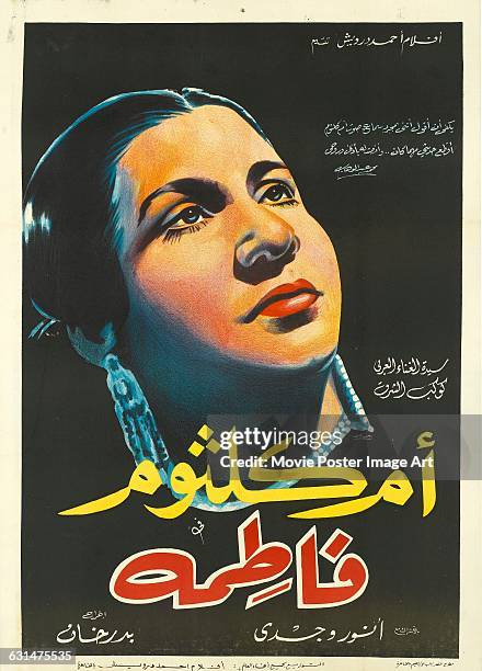 Egyptian actress and singer Umm Kulthum appears on a poster for the Egyptian film 'Fatima' , directed by Ahmed Badrakhan.