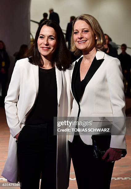 Journalists and partners Anne Will and Miriam Meckel arrive for the opening of the Elbphilharmonie concert hall in Hamburg, northern Germany, on...
