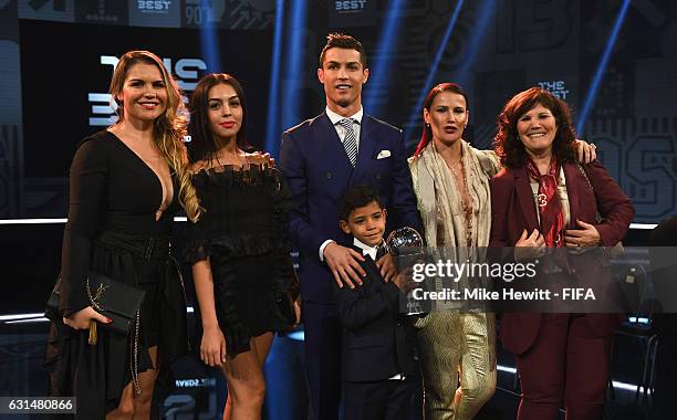 The Best FIFA Men's Player Award winner Cristiano Ronaldo of Portugal and Real Madrid poses with Georgina Rodriguez , his mother Maria Dolores dos...