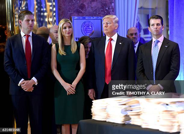 President-elect Donald Trump along with his children Eric Ivanka and Donald Jr. Arrive for a press conference January 11, 2017 at Trump Tower in New...