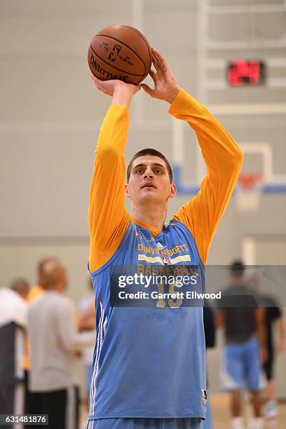 Nikola Jokic of the Denver Nuggets shoots during practice as part of 2017 NBA London Global Games at the Citysport on January 11, 2017 in London,...