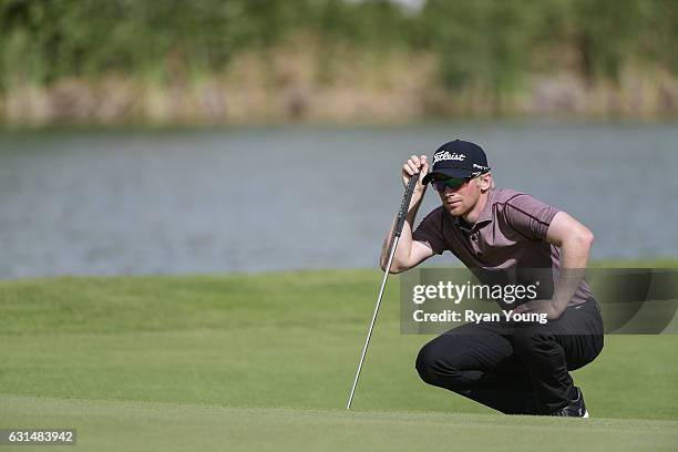 Anders Albertson lines up a putt on the first hole during the final round of The Bahamas Great Exuma Classic at Sandals - Emerald Bay Course on...