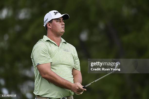 Michael Putnam tees off on the second hole during the final round of The Bahamas Great Exuma Classic at Sandals - Emerald Bay Course on January 11,...