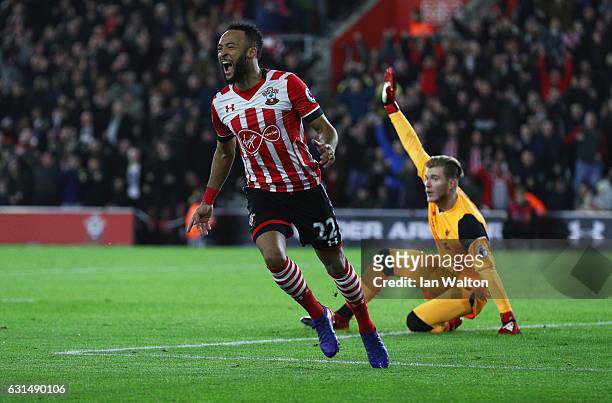 Loris Karius of Liverpool appeals as Nathan Redmond of Southampton celebrates as he scores their first goal during the EFL Cup semi-final first leg...