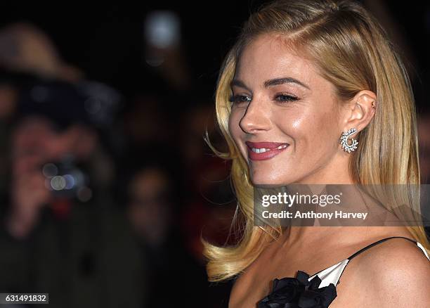Sienna Miller attends the premiere of "Live By Night" on January 11, 2017 in London, United Kingdom.