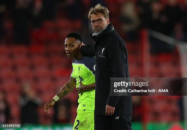 Jurgen Klopp manager / head coach of Liverpool and Nathaniel Clyne of Liverpool after the EFL Cup semi-final first leg match between Southampton and...