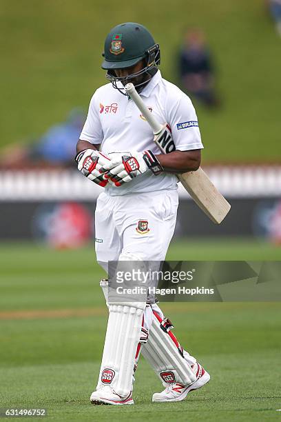 Imrul Kayes of Bangladesh leaves the field after being dismissed during day one of the First Test match between New Zealand and Bangladesh at Basin...