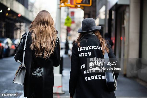 Guest wears a "Intoxicated with madness I'm in love with my sadness" Sylvia Plath / Smashing Pumpkins text jacket outside the Valentino Pre-Fall 2017...