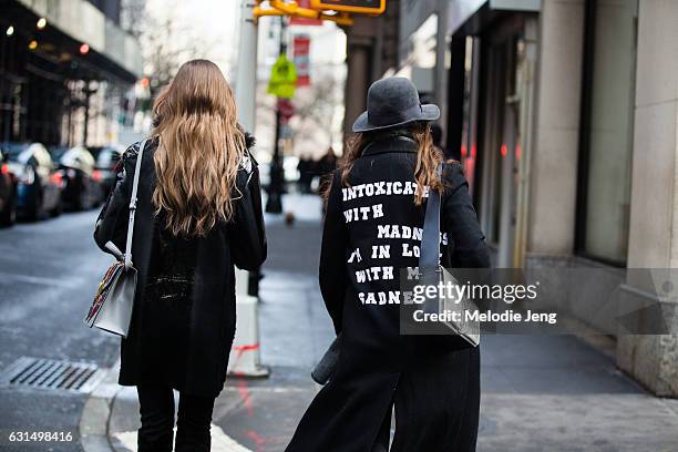 Guest wears a "Intoxicated with madness I'm in love with my sadness" Sylvia Plath / Smashing Pumpkins text jacket outside the Valentino Pre-Fall 2017...