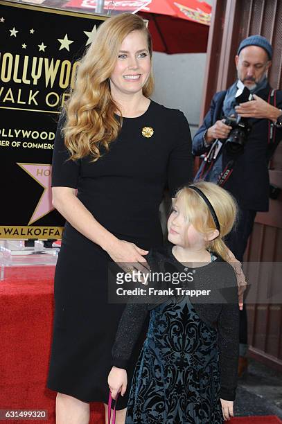 Actress Amy Adams and her daughter Aviana Olea Le Gallo attend star ceremony on the Hollywood Walk of Fame on January 11, 2017 in Hollywood,...